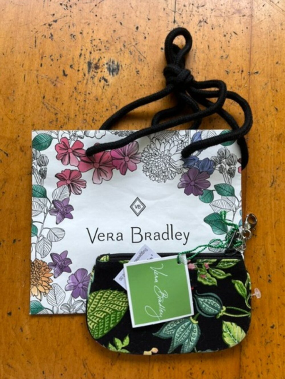 Vera Bradley small coin purse with zipper.